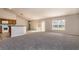 Inviting living area featuring a breakfast bar and a slider to the backyard at 935 Gloucester Court, Kissimmee, FL 34758