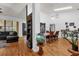 Bright open-concept dining room featuring high ceilings, wood floors, and modern decor at 10400 Hunters Trail Ct, Orlando, FL 32817