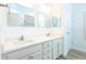 Bathroom with double sink vanity, quartz countertop, and modern fixtures at 113 Golden Crest Ct, Winter Springs, FL 32708