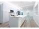 Modern kitchen featuring a large island, stainless steel appliances, and open layout for entertaining and cooking at 113 Golden Crest Ct, Winter Springs, FL 32708