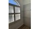 Bright nook with modern window shutters and stylish floating glass shelves at 113 Golden Crest Ct, Winter Springs, FL 32708