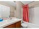 A functional full bathroom with a combined bathtub and shower, and a single sink at 1234 1St Ave, Deland, FL 32724