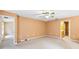 Large empty room with fresh paint, carpet and ceiling fan at 1234 1St Ave, Deland, FL 32724