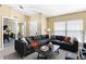 Stylish living room with modern sectional sofa and area rug at 1234 1St Ave, Deland, FL 32724