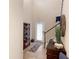 Elegant foyer with high ceilings, a tiled floor, and a staircase at 1304 Independence Ln, Mount Dora, FL 32757