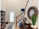 Inviting foyer features tile flooring and staircase at 1304 Independence Ln, Mount Dora, FL 32757