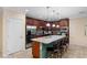 Spacious kitchen features a large island with bar seating and stainless steel appliances at 1304 Independence Ln, Mount Dora, FL 32757