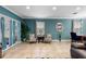 Bright living room with neutral tones, tile floors, and views of the outdoors at 1304 Independence Ln, Mount Dora, FL 32757