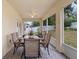 Covered outdoor patio with tile floors, a ceiling fan, and views of the backyard at 1304 Independence Ln, Mount Dora, FL 32757