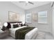 Bedroom has an area rug, dark wood decor, neutral walls and two windows at 13349 Alderley Dr, Orlando, FL 32832
