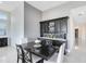 The dining area features a stylish bar with built-in wine storage and display at 13349 Alderley Dr, Orlando, FL 32832