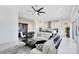 Bright open floor plan living and dining area features a kitchen with stainless appliances at 13349 Alderley Dr, Orlando, FL 32832