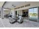 Spacious patio with table and seating and view of backyard and nearby rooms at 13349 Alderley Dr, Orlando, FL 32832