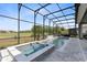 This beautiful screened pool features a hot tub, waterfall, and gorgeous golf course view, for exercise and relaxation at 13349 Alderley Dr, Orlando, FL 32832