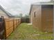 Fenced backyard with well maintained fence at 1415 Meadowlark St, Longwood, FL 32750