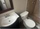 Bathroom with a vanity, toilet and a tiled shower stall at 1415 Meadowlark St, Longwood, FL 32750