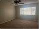 Bedroom featuring carpeted floors, neutral walls and a large window at 1415 Meadowlark St, Longwood, FL 32750