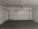 This garage features a clean, empty space with a working garage door opener at 1415 Meadowlark St, Longwood, FL 32750