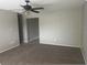 Spacious living room featuring ceiling fan and neutral paint at 1415 Meadowlark St, Longwood, FL 32750
