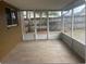 Outdoor patio with tile flooring and screened windows at 1415 Meadowlark St, Longwood, FL 32750