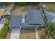An aerial view showcases the property's roof, yard and its overall layout at 1633 Colton, Orlando, FL 32822