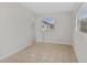 Neutral bedroom featuring tile floors, and a window with natural light at 1633 Colton, Orlando, FL 32822