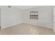 Neutral bedroom with tile flooring and a window at 1633 Colton, Orlando, FL 32822