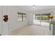 Bright dining room featuring a tile floor and sliding glass doors to the patio at 1633 Colton, Orlando, FL 32822