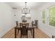 Dining room featuring hardwood floors and a view of the kitchen at 1638 Mount Vernon St, Orlando, FL 32803