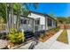 Exterior view of a home with a deck and landscaped yard, showcasing its curb appeal and inviting outdoor space at 1638 Mount Vernon St, Orlando, FL 32803
