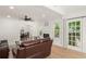 Bright living room featuring hardwood floors, neutral paint and a fireplace at 1638 Mount Vernon St, Orlando, FL 32803