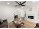 Living room featuring hardwood floors and view of the dining room and kitchen at 1638 Mount Vernon St, Orlando, FL 32803