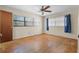 Bedroom with wood floors, a ceiling fan, and lots of natural light at 1807 Yorkshire Dr, Winter Park, FL 32792