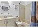 Well-lit bathroom features a tub-shower combo and a vanity with storage at 2568 Woodgate Blvd # 204, Orlando, FL 32822