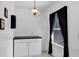 White kitchen featuring modern cabinets and window with natural light, creating a clean and inviting space at 2568 Woodgate Blvd # 204, Orlando, FL 32822