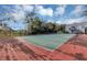 Well-maintained community tennis court for active recreation at 2568 Woodgate Blvd # 204, Orlando, FL 32822