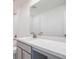 Bathroom featuring vanity with a single sink, a large mirror, and tub with shower at 307 Corsica Ct, Kissimmee, FL 34758