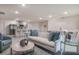Bright living room with stylish decor, plenty of seating, and an open layout at 307 Corsica Ct, Kissimmee, FL 34758
