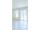 Bright living room with large windows offering natural light at 307 Corsica Ct, Kissimmee, FL 34758