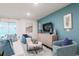 Cozy living area with comfortable seating and ample natural light at 307 Corsica Ct, Kissimmee, FL 34758