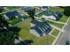 Expansive aerial view of a lovely home, showcasing the well-manicured lawn and surrounding neighborhood at 311 W Delaware Ave, Lake Helen, FL 32744