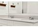 Close up of a stylish double vanity with a gray countertop and chrome faucets at 312 Inman Blvd, Winter Haven, FL 33881