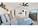 Well-lit bedroom with neutral tones and modern furnishings, showing access to bathroom and kitchen at 312 Inman Blvd, Winter Haven, FL 33881