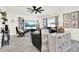 Bright living room with a large window, modern decor, and comfortable seating arrangement at 312 Inman Blvd, Winter Haven, FL 33881