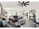 Comfortable living room with modern furniture, open to the kitchen area at 312 Inman Blvd, Winter Haven, FL 33881