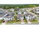 Aerial view of a residential community with single-Gathering homes and tree-lined streets at 3121 Buffington Pl, Oviedo, FL 32765