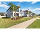 Charming two-story home with landscaped front yard and modern architectural details at 3121 Buffington Pl, Oviedo, FL 32765