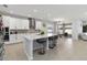 Spacious kitchen with large island, stainless steel appliances, and open layout at 3121 Buffington Pl, Oviedo, FL 32765