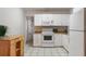 Functional kitchen with white cabinets and appliances, offering a clean and efficient cooking space at 3214 Debbie Dr, Orlando, FL 32806