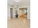 Inviting living room featuring tile floors and easy access to additional rooms at 3214 Debbie Dr, Orlando, FL 32806